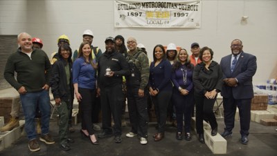 Matthew Bracey with school officials and Carhartt's Todd Corley, Chief People & Impact Officer