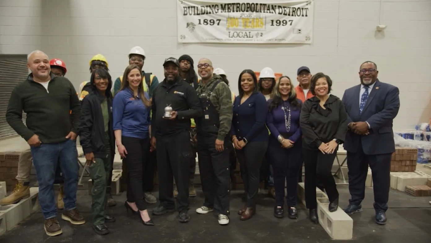 Matthew Bracey with school officials and Carhartt’s Todd Corley, Chief People & Impact Officer