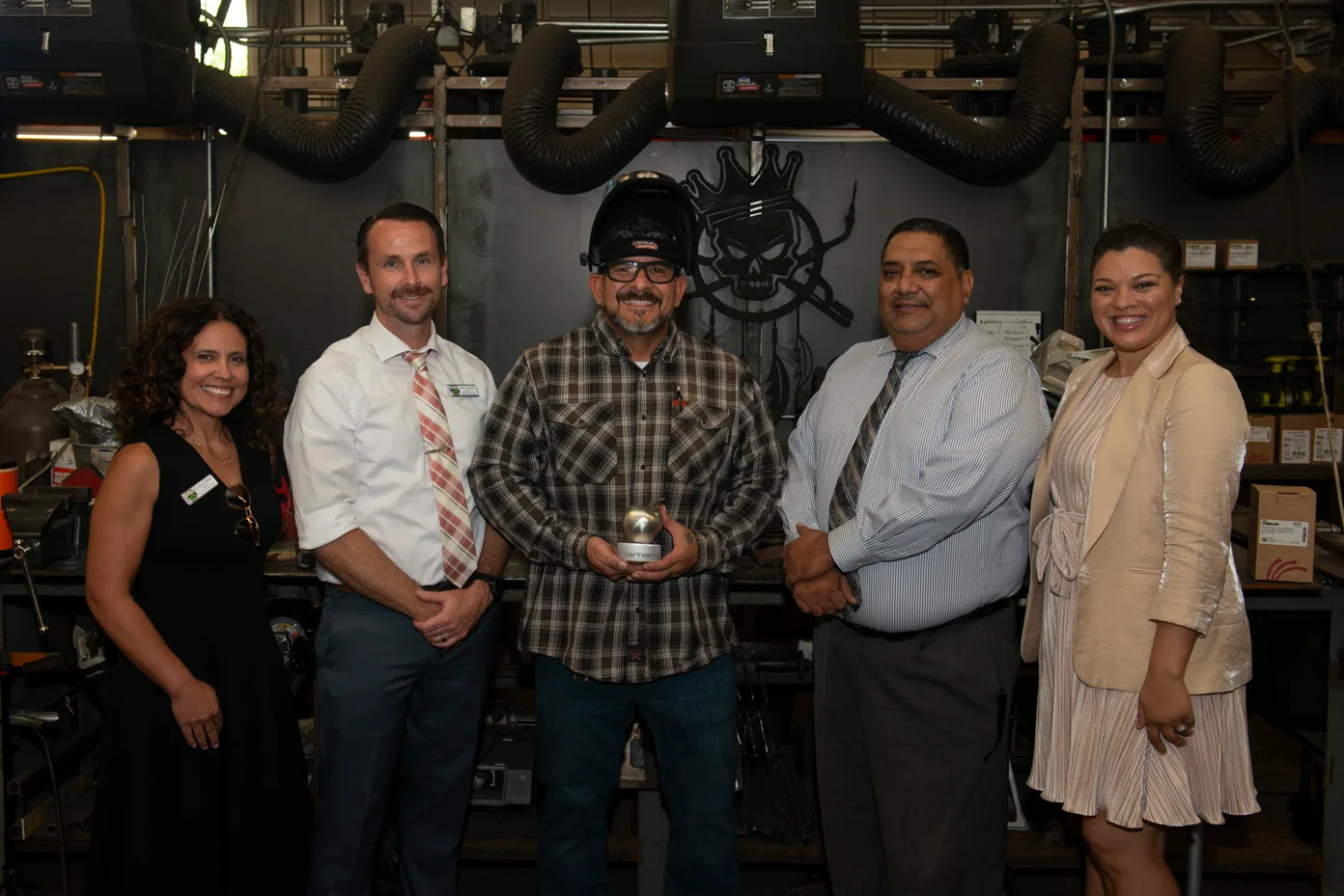 Josh O’Neal being presented the Steel Apple Award by Hemet Unified School District officials
