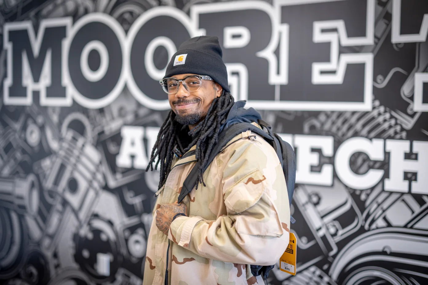 A Moore Tech automotive student in his new Carhartt workwear