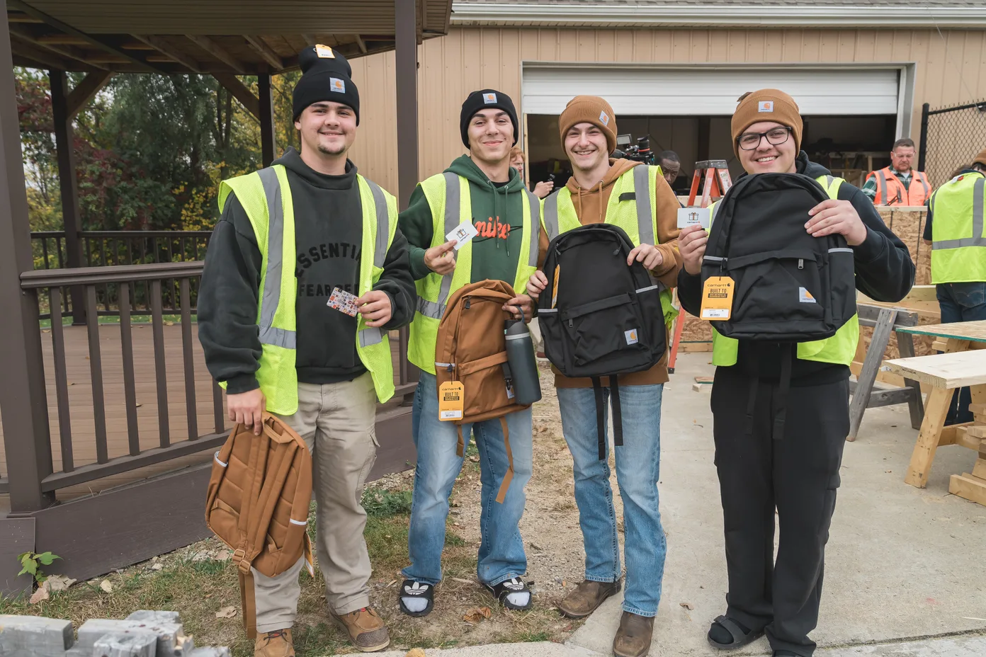 Oakland Schools Technical Center Northeast students celebrate Aaron Swett’s 2026 Steel Apple Award in their new Carhartt gear